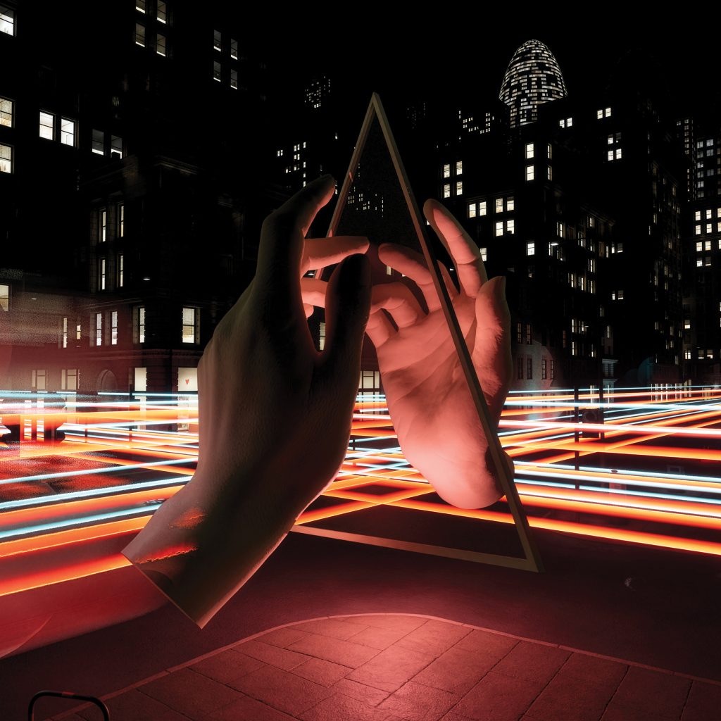 Portada oficial de “A Death In London” de Ladytron, con manos formando un triángulo luminoso sobre una ciudad nocturna, arte del nuevo single incluido en el álbum Paradises.